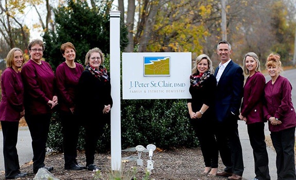 Doctor Saint Clair and his Rowley Massachusetts dental team