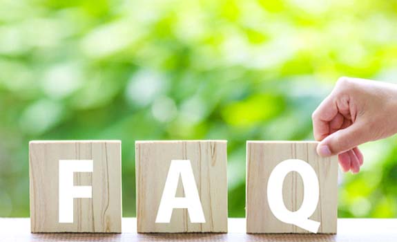 Series of wooden blocks reading “FAQ”