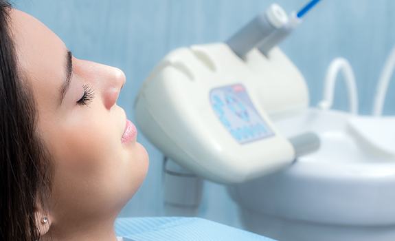 Patient with eyes closed during sleep dentistry visit