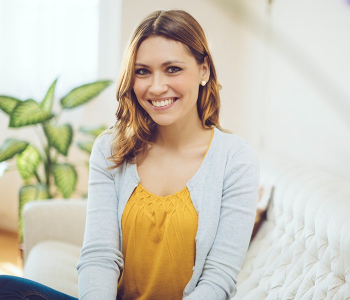 Woman with gorgeous smile after cosmetic dentistry