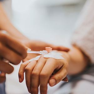 Iv being placed in patient’s hand