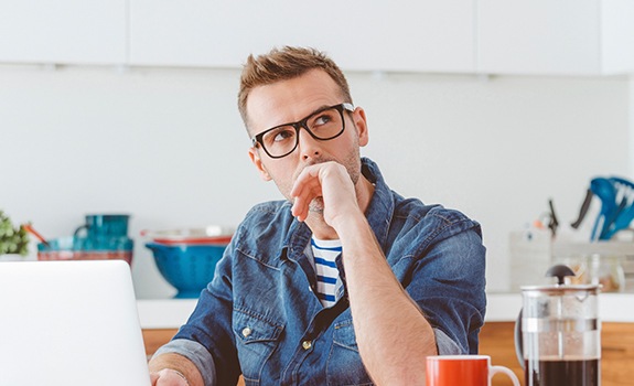 Man considering porcelain veneers