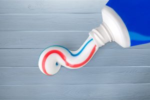 Toothpaste being dispensed 