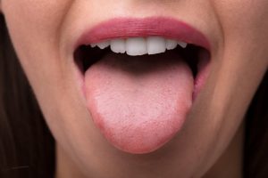 woman sticking out her tongue
