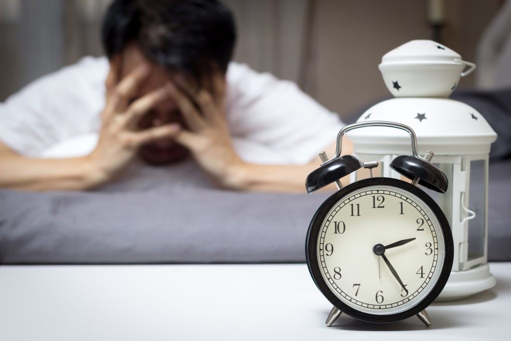 man struggling to stay awake